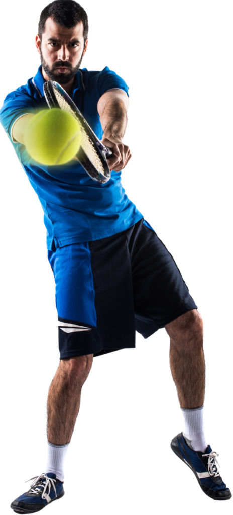 Man playing tennis, wearing a blue shirt and black shorts, hitting a tennis ball with a racket.