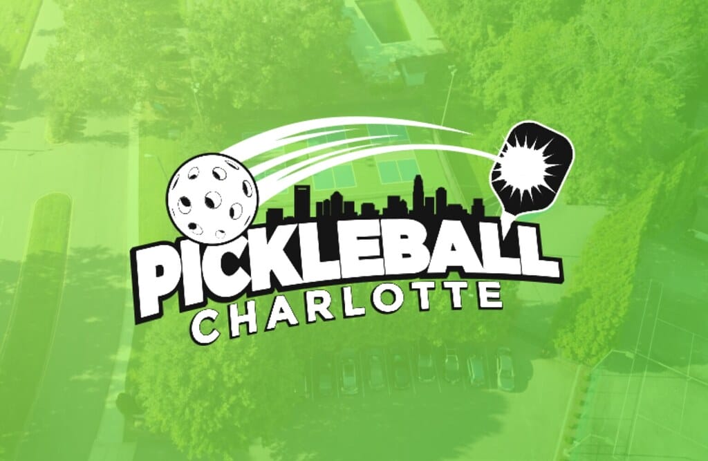 Pickleball Charlotte logo: pickleball in motion with city skyline on green background.