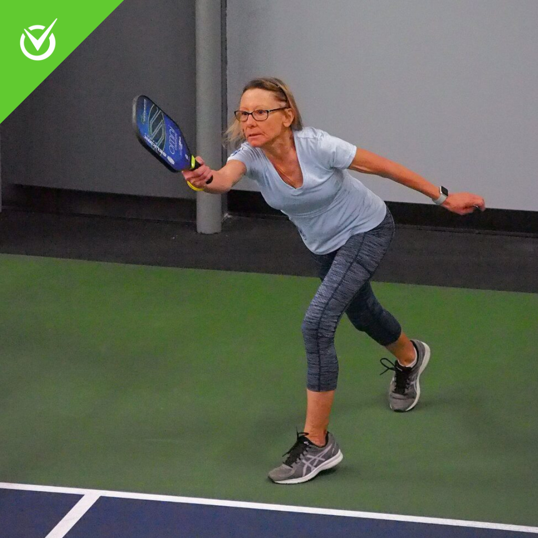 Pickleball player at Pickleball Zone swinging paddle