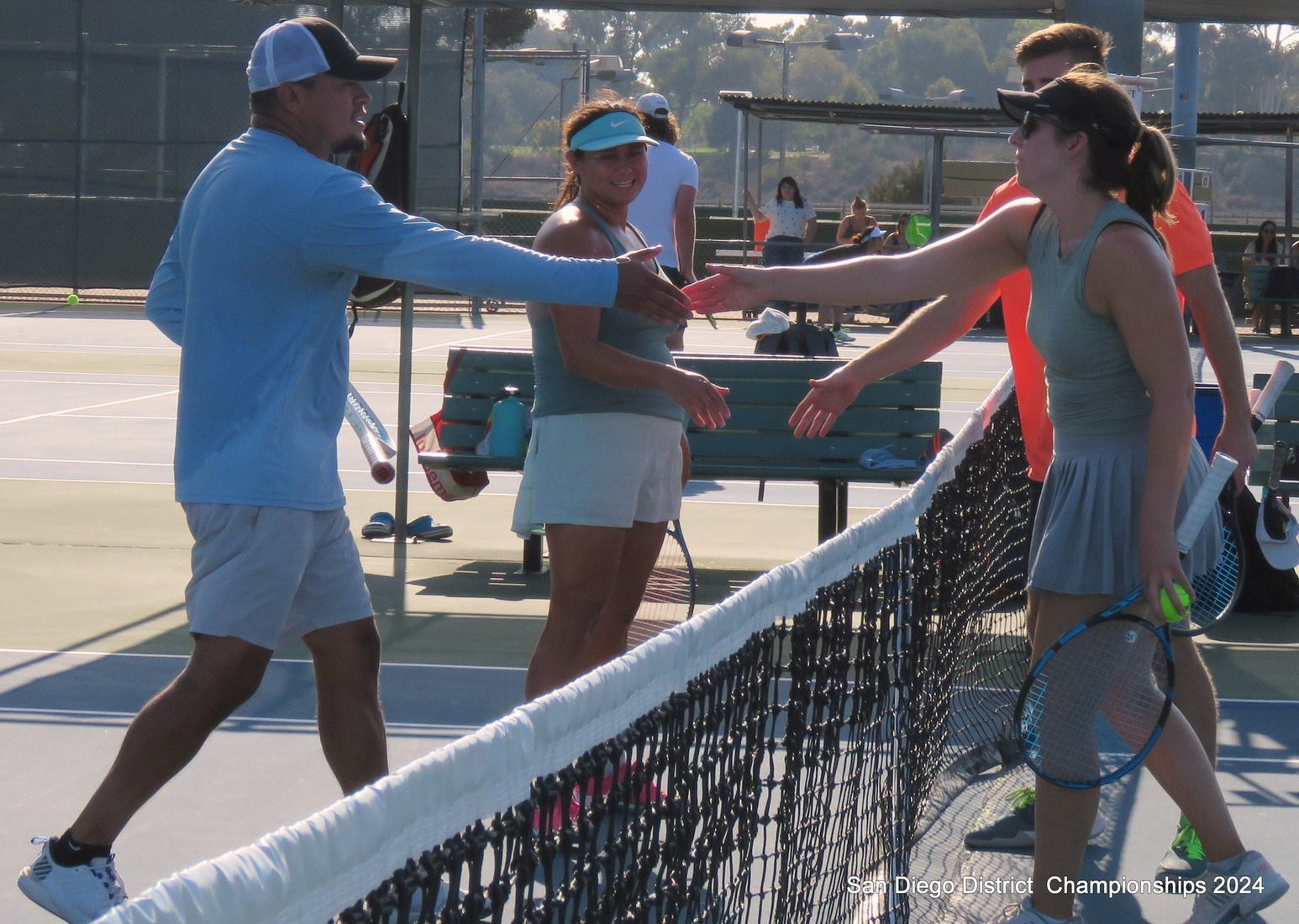 Balboa Tennis Club players shaking hands